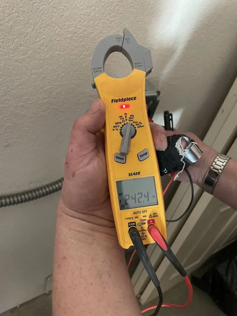 Voltage testing with clamp meter during Recessed Lighting Installation in Gresham Park